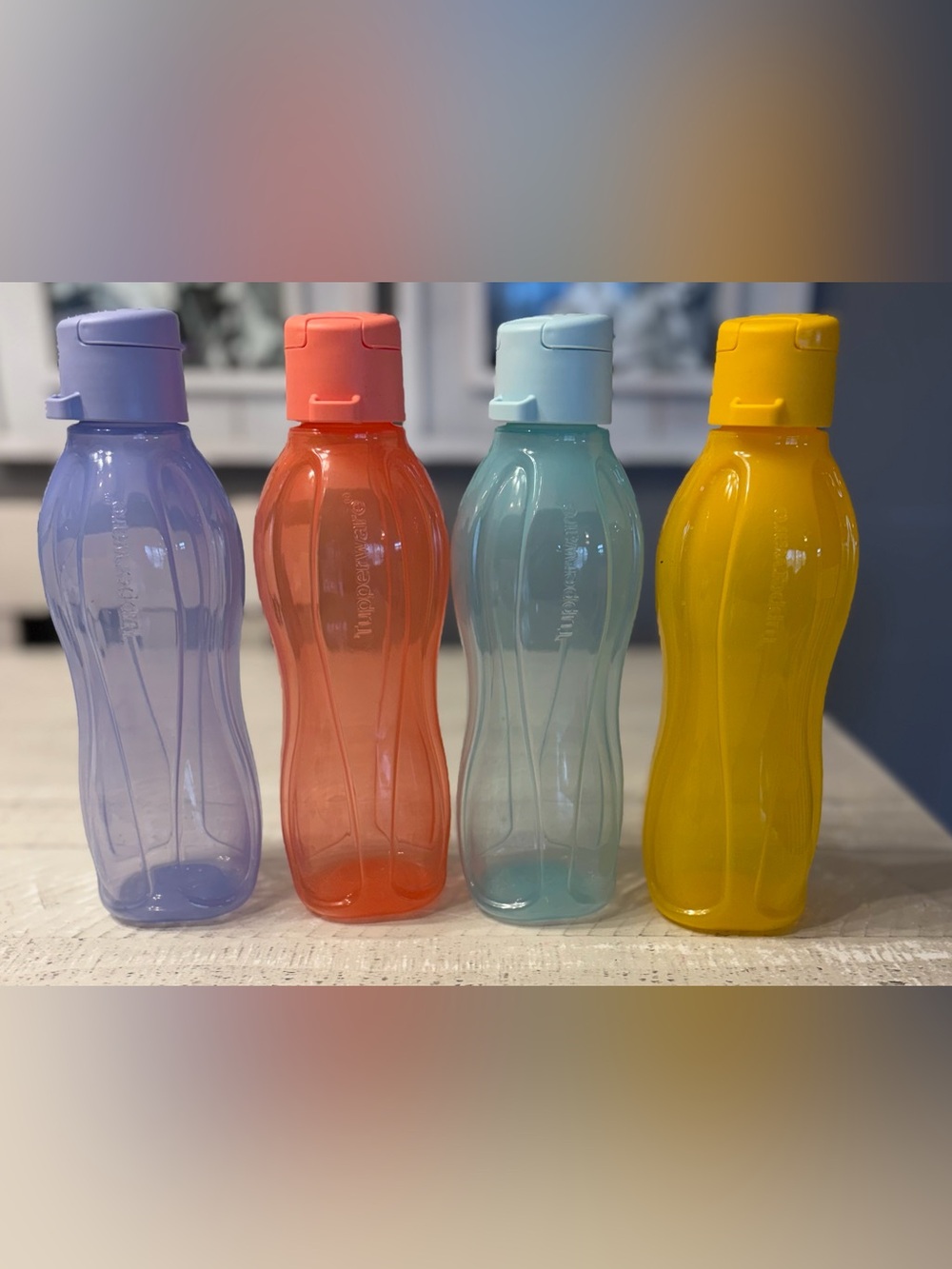 Tupperware Coral, Aqua & Yellow Wave Bottles